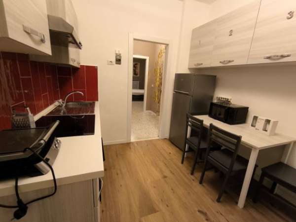 Foto Affitto camere con spazi comuni.