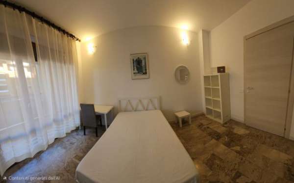 Foto Ampia stanza singola con terrazzo Milano