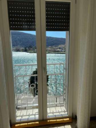 Foto Attico / Mansarda di 100 m con 3 locali e box auto in affitto a Sarnico