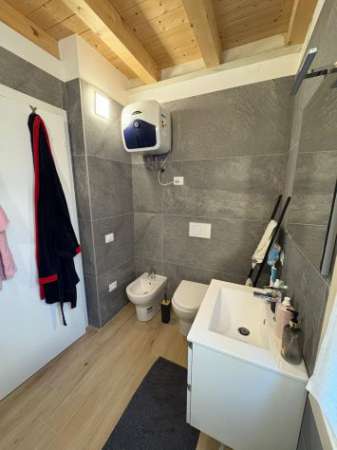 Foto Bellissimo duplex con giardino a Marocco di Mogliano