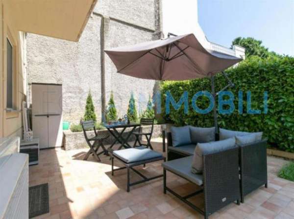 Foto BILOCALE CON PATIO E GIARDINO