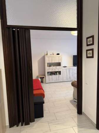 Foto Bilocale in affitto a Caronno Pertusella