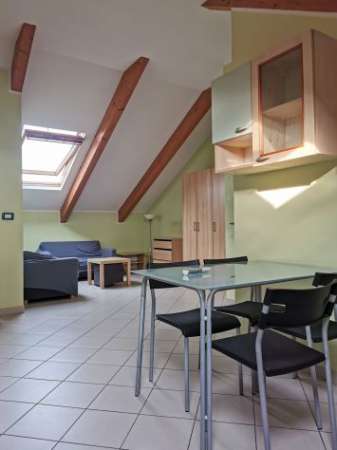 Foto Bilocale Mansardato Arredato