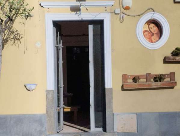Foto Bottega in centro doppia esposizione