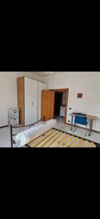 Foto Camera a porta a lucca