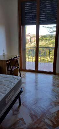 Foto Camera a Scacciapensieri