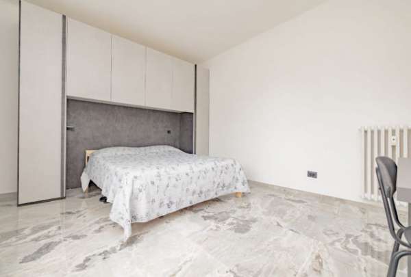 Foto Camera con letto matrimoniale