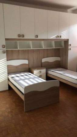 Foto Camera condivisa per studentesse