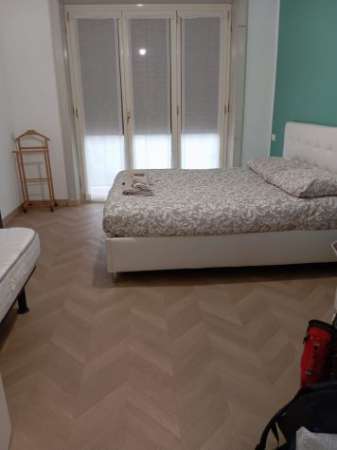 Foto Camera matrimoniale metropolitana gialla