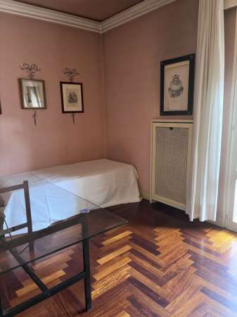 Foto Camera singola con bagno e guardaroba privato