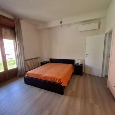 Foto Camera singola con bagno privato e balcone