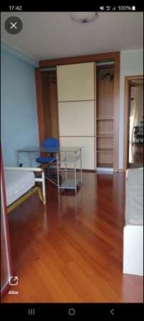Foto Camere singole in appartamento arredato luminoso  CB