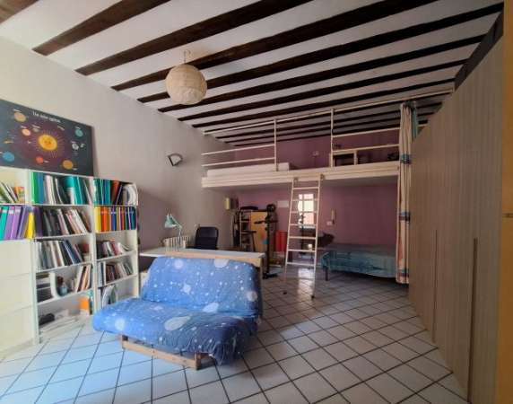 Foto CONDIVISIONE BILOCALE PORTA TICINESE PER RAGAZZA