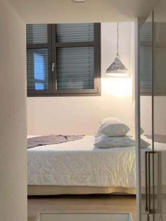 Foto Cozy Room  In the heart of Como  Vicino al Lago