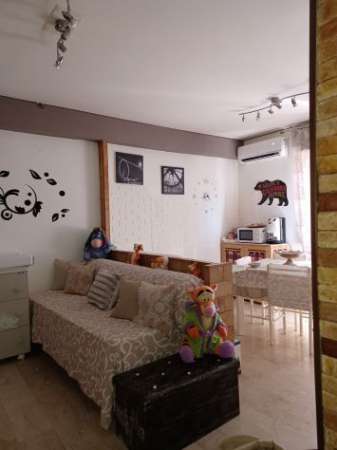 Foto Delizioso bivani arredato