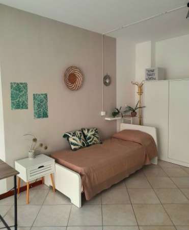 Foto Due posti letto in camera doppia