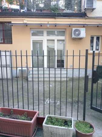 Foto Grazioso bilocale con giardino