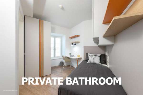 Foto In centro stanza con bagno privato [TN_GVN3-1_S5]