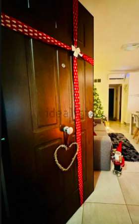 Foto INFERNETTO TRILOCALE CON BALCONE E POSTO AUTO E DOPPI SERVIZI