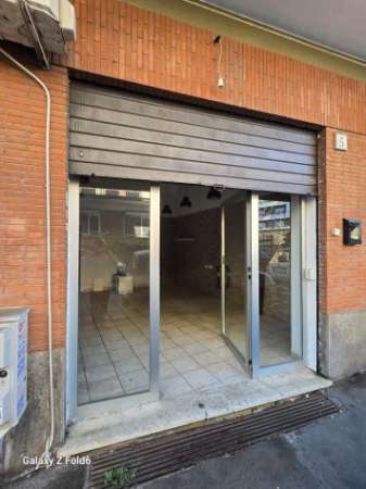 Foto LOCALE COMMERCIALE PORTUENSE IMBRECCIATO