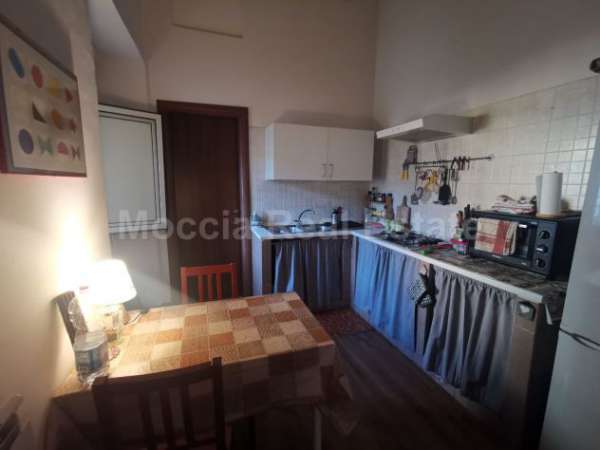 Foto MOCCIA BILOCALE ARREDATO CENTRO VIA SAN CARLO CON POSTO AUTO (DA)