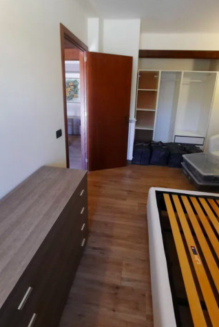 Foto OLGIATA BILOCALE ARREDATO CON GIARDINO MATTONATO E BOX AUTO.