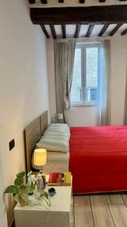 Foto Singola con letto matrimoniale