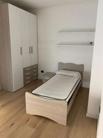 Foto Stanza in appartamento in affitto a Trento