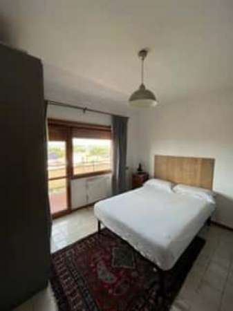 Foto Stanza Privata con letto doppio con bagno e terrazzo