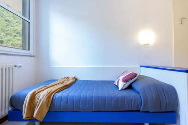 Foto Stanza singola con bagno condiviso