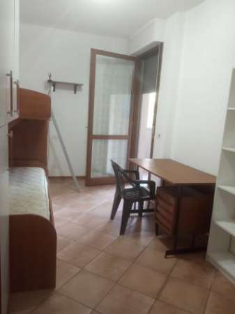 Foto Stanza singola con balcone privato a ragazza