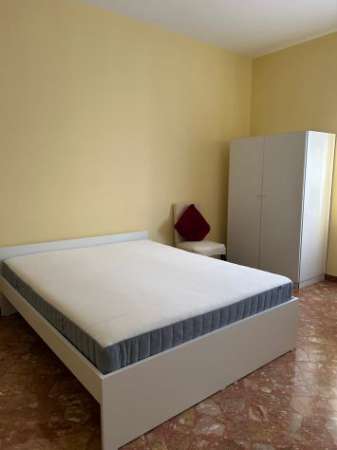 Foto Studentessa lavoratrice