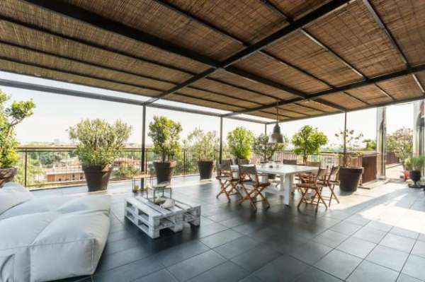 Foto superattico con  terrazzo perimetrale e piscina pensile