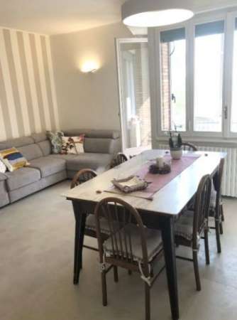 Foto Trilocale con doppio balcone e cantina-MM2