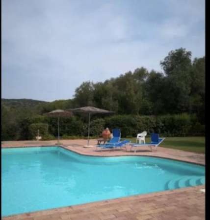 Foto Villa con piscina