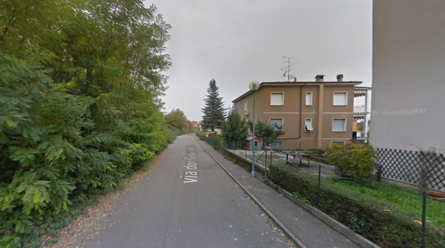 Foto Villetta a schiera con giardino e box